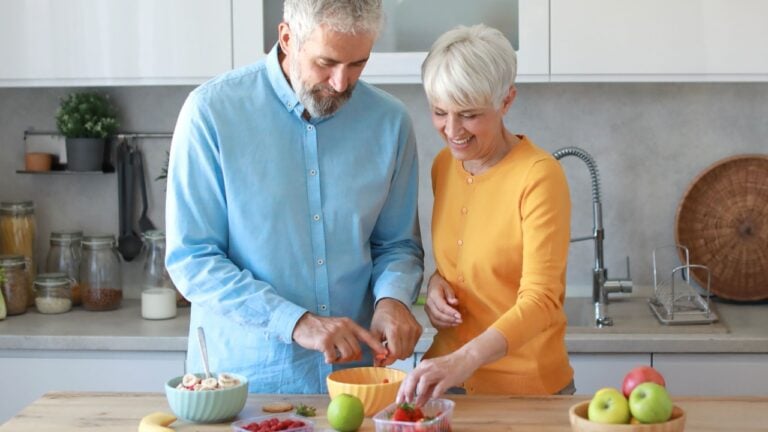 Portrait of a senior mature couple having a healthy breakfast in the morning at home