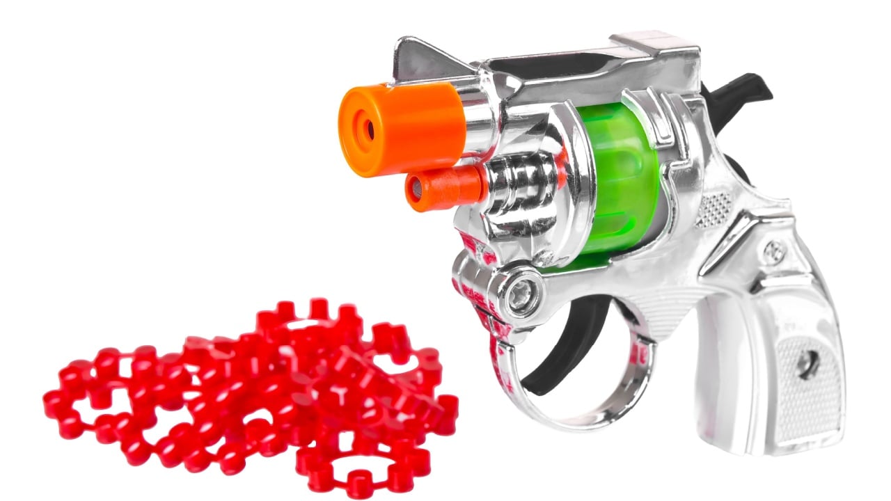 Mini toy gun with powder