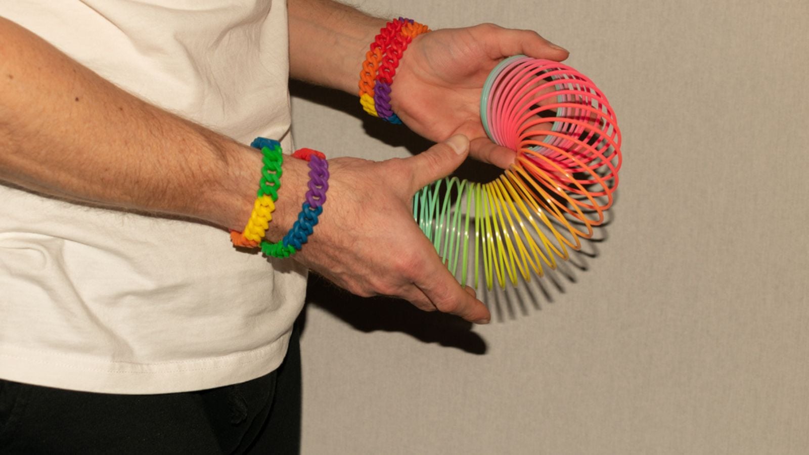 Vaduz, Liechtenstein. Having fun with a rainbow colored slinky