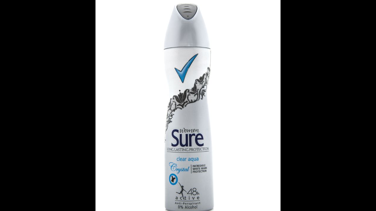 SWINDON, UK - FEBRUARY 2, 2014: Sure for Woman antiperspirant aerosol on a with background
