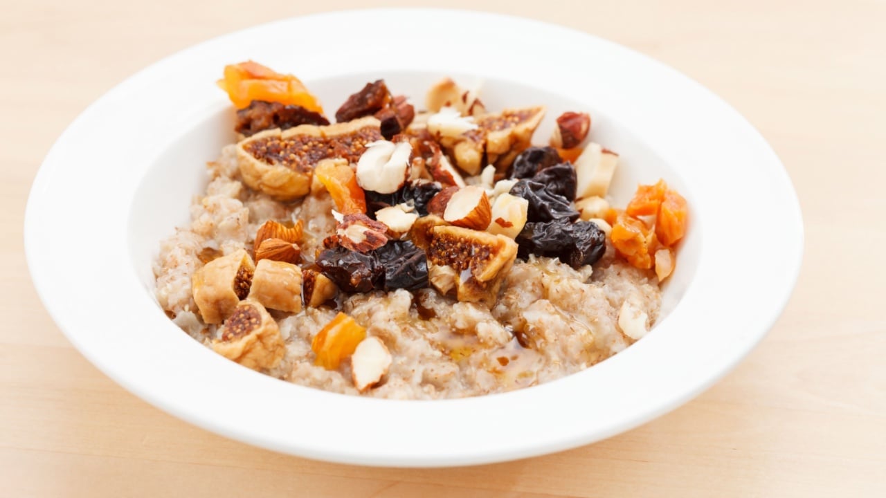 oatmeal with raisins, nuts and maple syrup