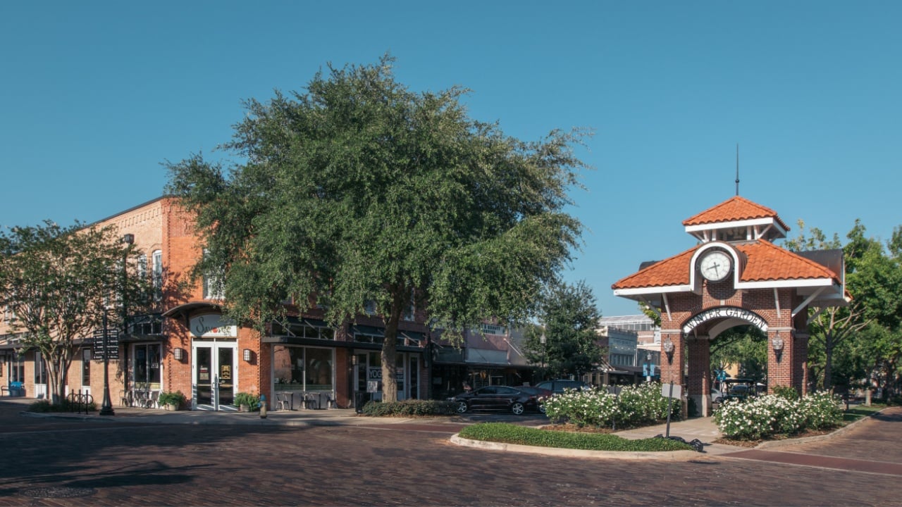 WINTER GARDEN, FLORIDA: MAY 29, 2019 - Historic brick clock tower at the intersection of Plant and Main street in downtown Winter Garden.