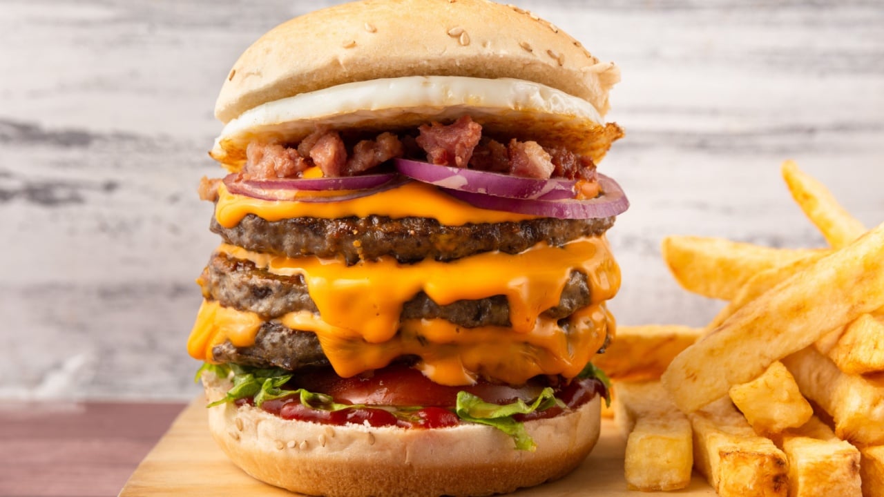 triple giant hamburger with cheddar cheese