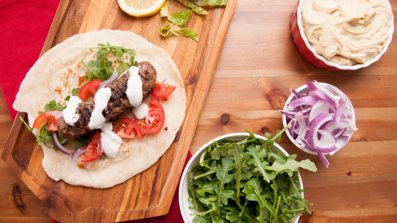 roasted lamb kofte with cool yogurt tzatziki and hummus