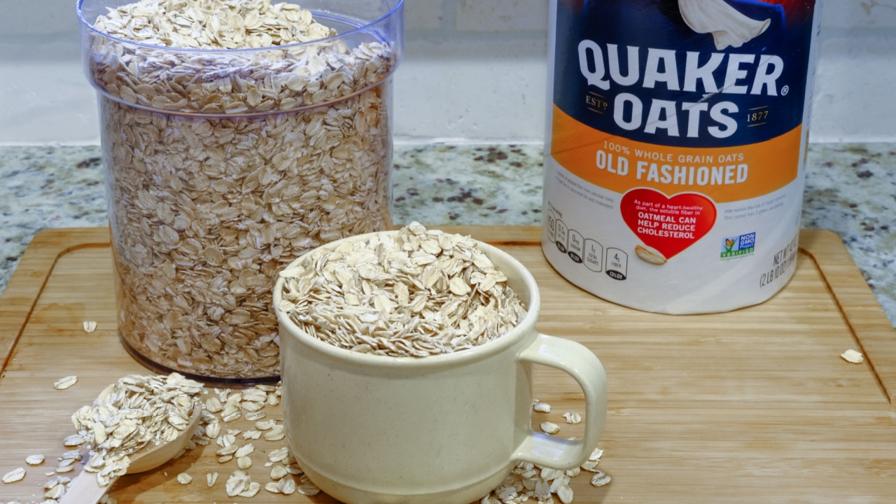 Quaker Oats Ready to Cook on a Wooden Cutting Board for Illustrative Editorial