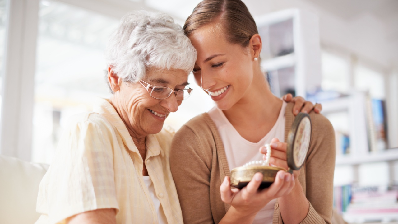 This is their family heirloom. Cropped shot of a senior woman giving her daughter a pearl necklace.