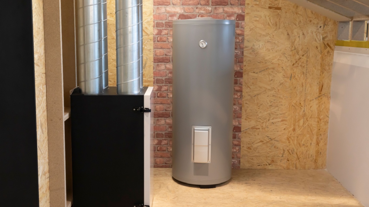 Grey Electric storage water heater with Temperature Display in utility room, brick wooden wall. Hi-Tech Capillary Thermostat. Safe, Environment Friendly system. Smart home, house. Horizontal