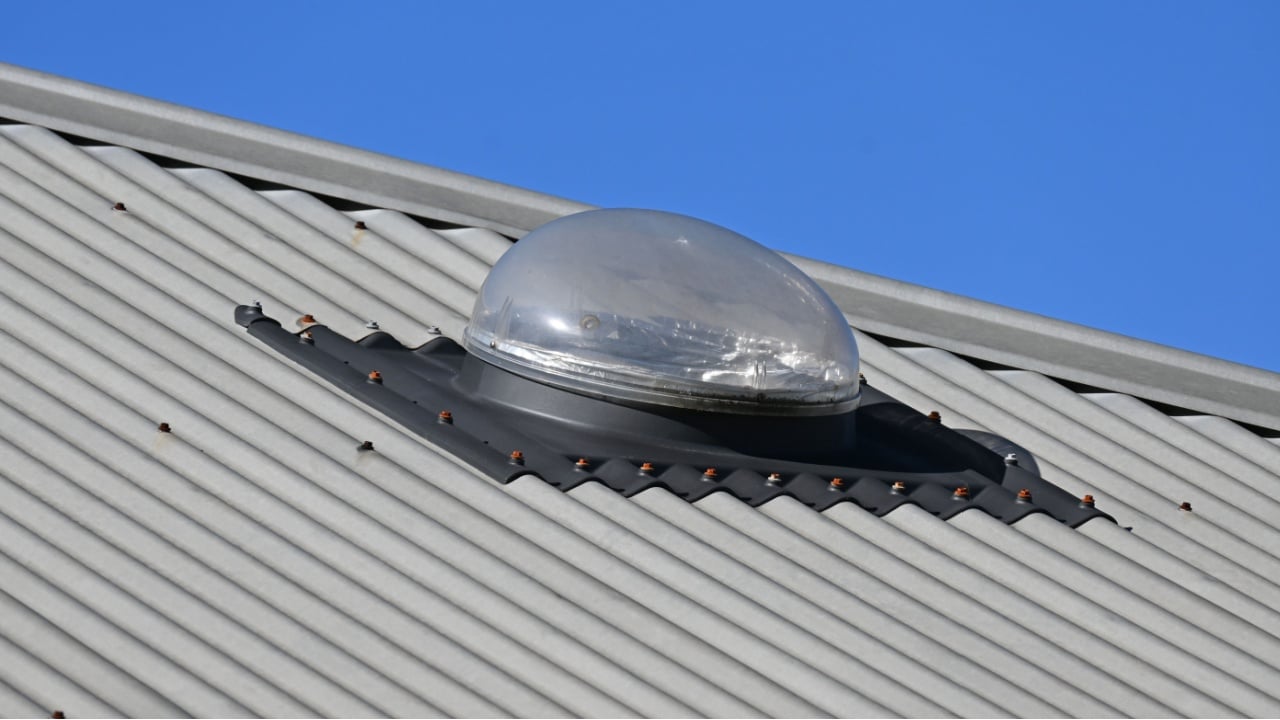 Solar tube skylight on a house roof
