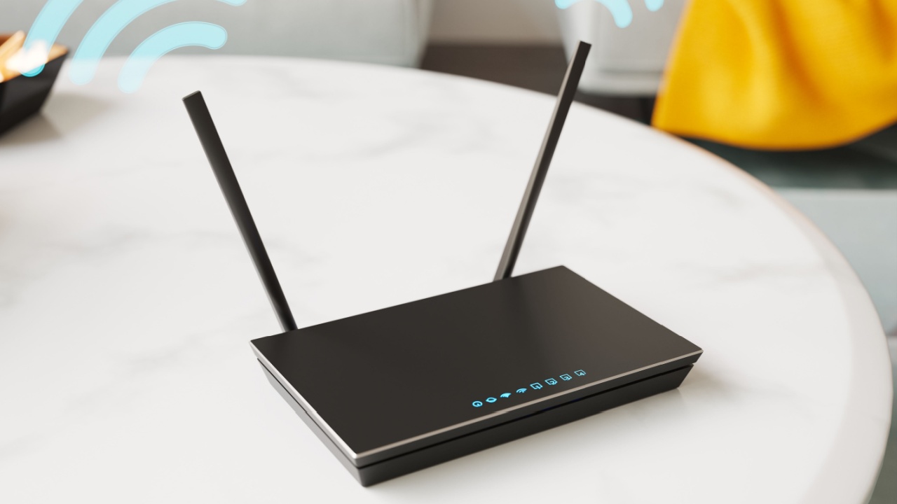 The black router on the table in the apartment. A device provides internet.