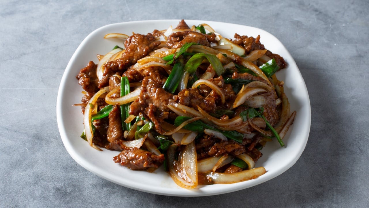A view of a plate of Mongolian beef.