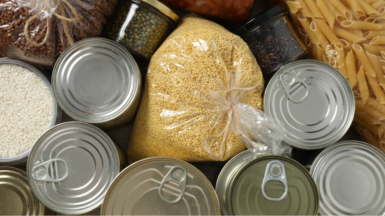 Food donations on wooden background