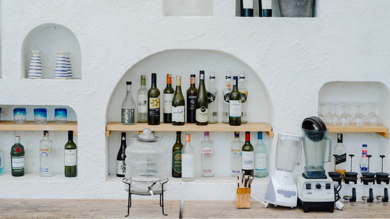 Indonesia, 19 November 2023 : cafe bar with bottle rack. curved walls with a minimalist design with a Scandinavian theme