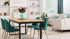 Dining table and chairs in room. Interior design with color accent