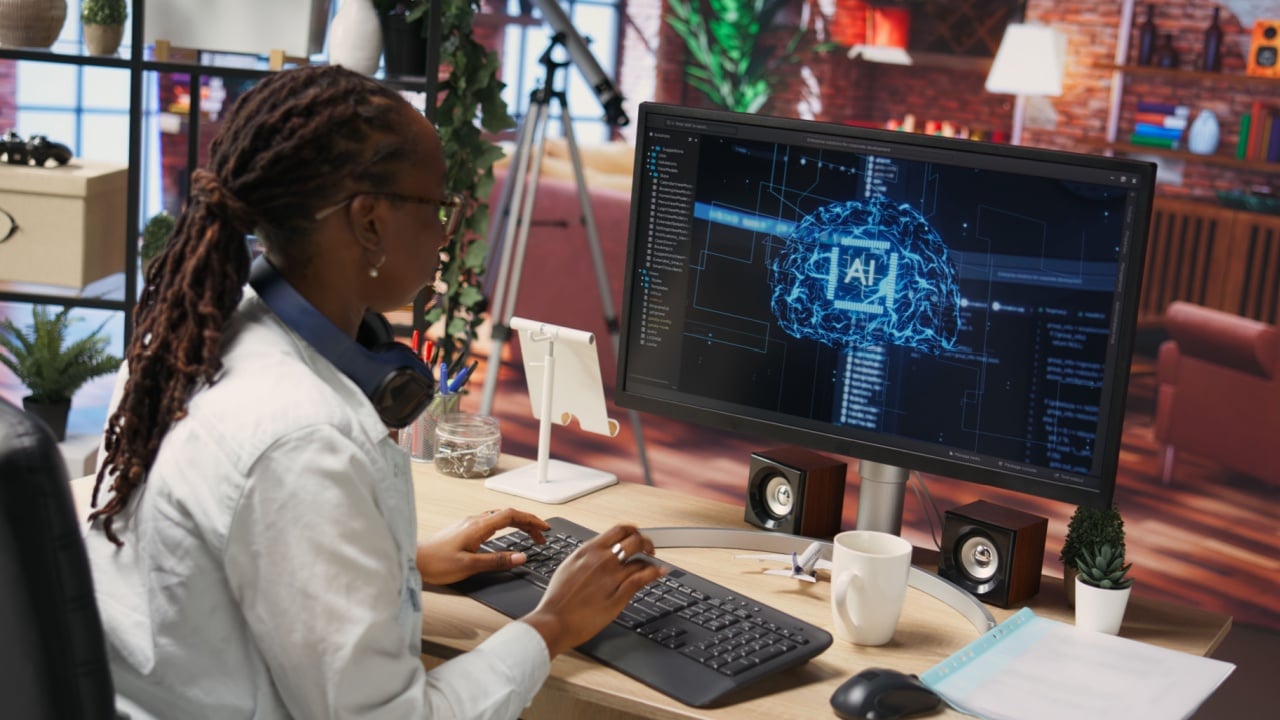 Overjoyed programmer happily clapping hands after finishing maintenance on neural networks. IT expert doing ecstatic fist pump in air hand gesture after successful checkup on AI systems, camera B