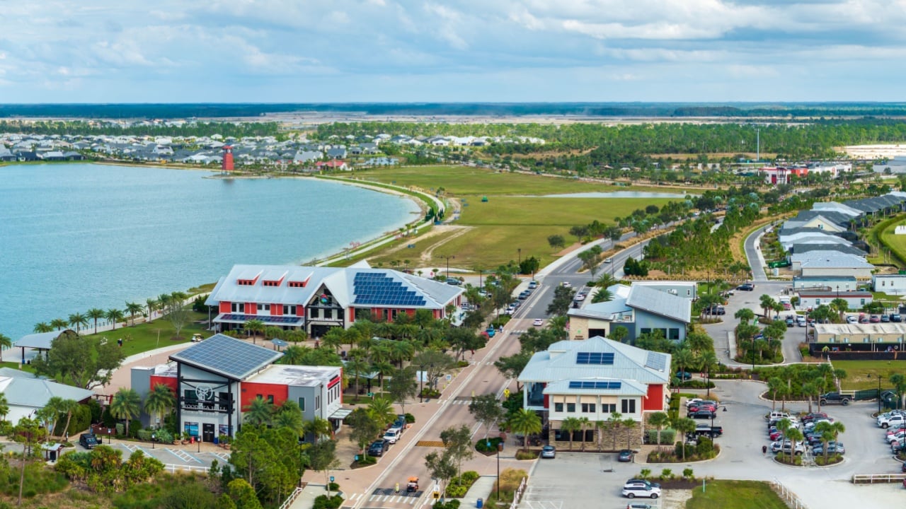 Florida office buildings with solar roof in small autonomous town. Photovoltaic panels for electric energy. Investing in renewable electricity concept. Babcock Ranch, Florida, USA - November 15, 2023.