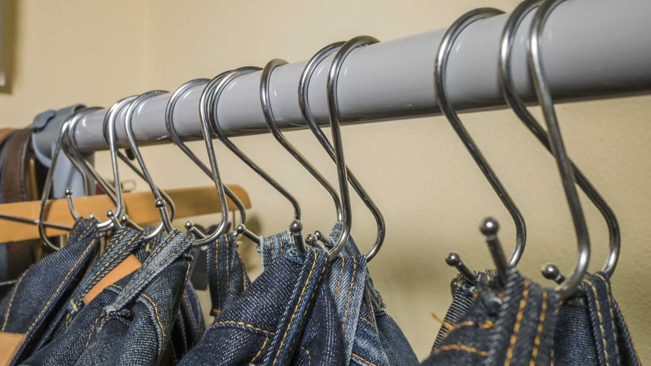 Closeup , Hanging Jeans pants on loop hook