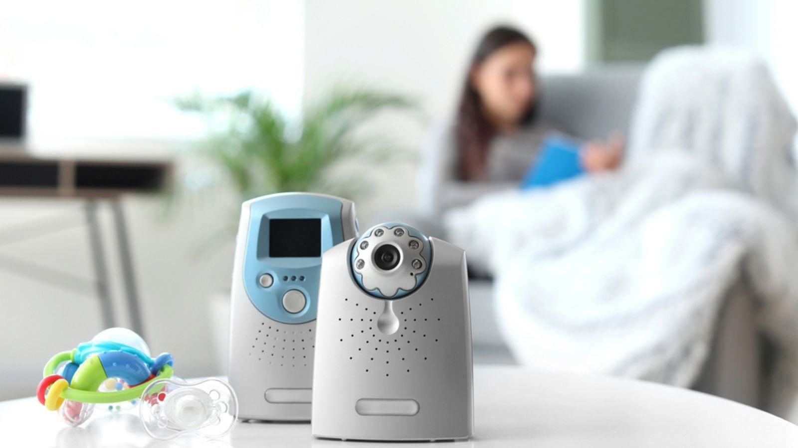 Video baby monitor on table in room