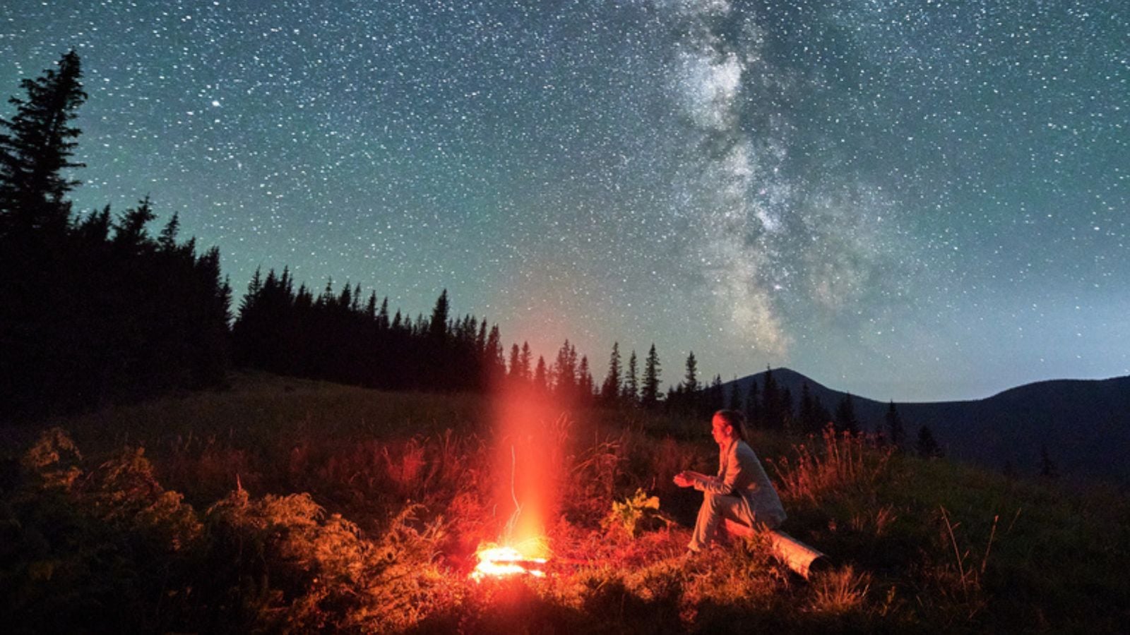 stargazing star camping outside night campfire tent