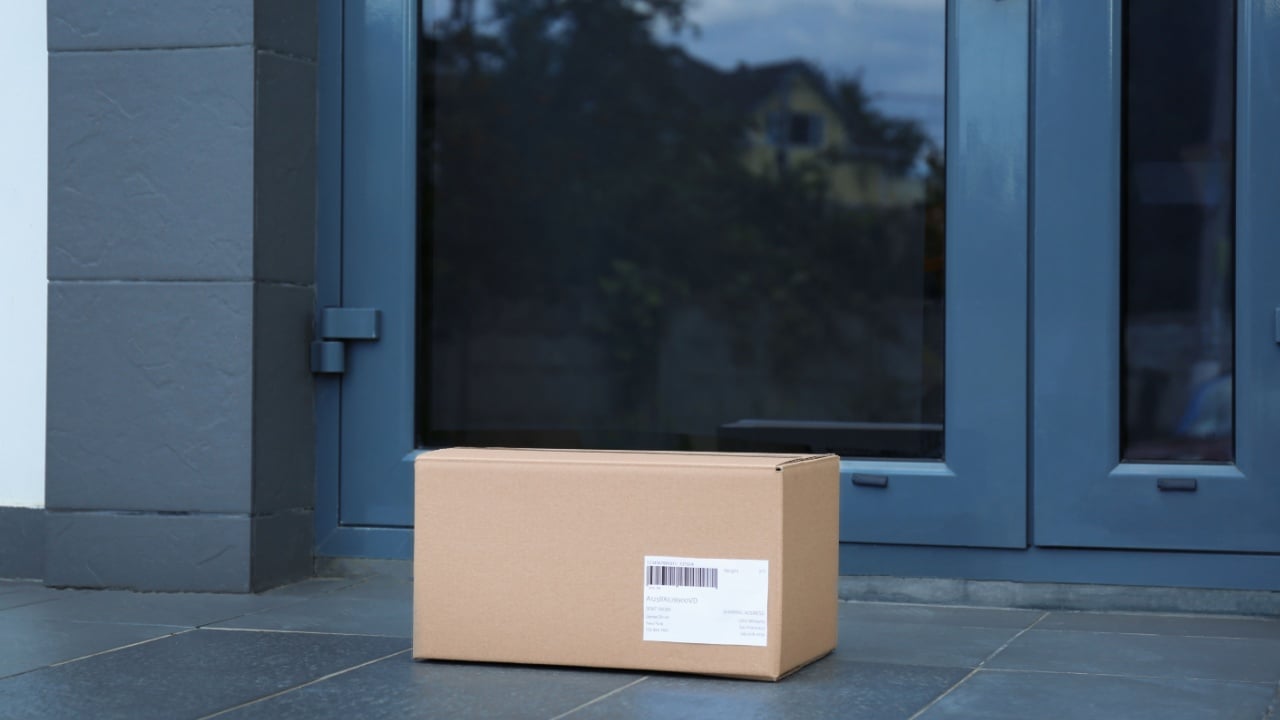 Parcel box on floor near office entrance