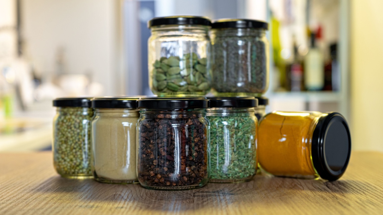 spices and herbs in glass jars for cooking, indian spices, multi colored