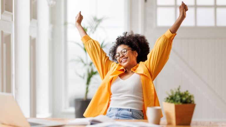 https://www.backyardgardenlover.com/wp-admin/post.php?post=72989&action=edit&classic-editor Joyful african american business woman freelancer smiling and rejoices in victory while sitting at desk and working at laptop screen after finishing project in home office