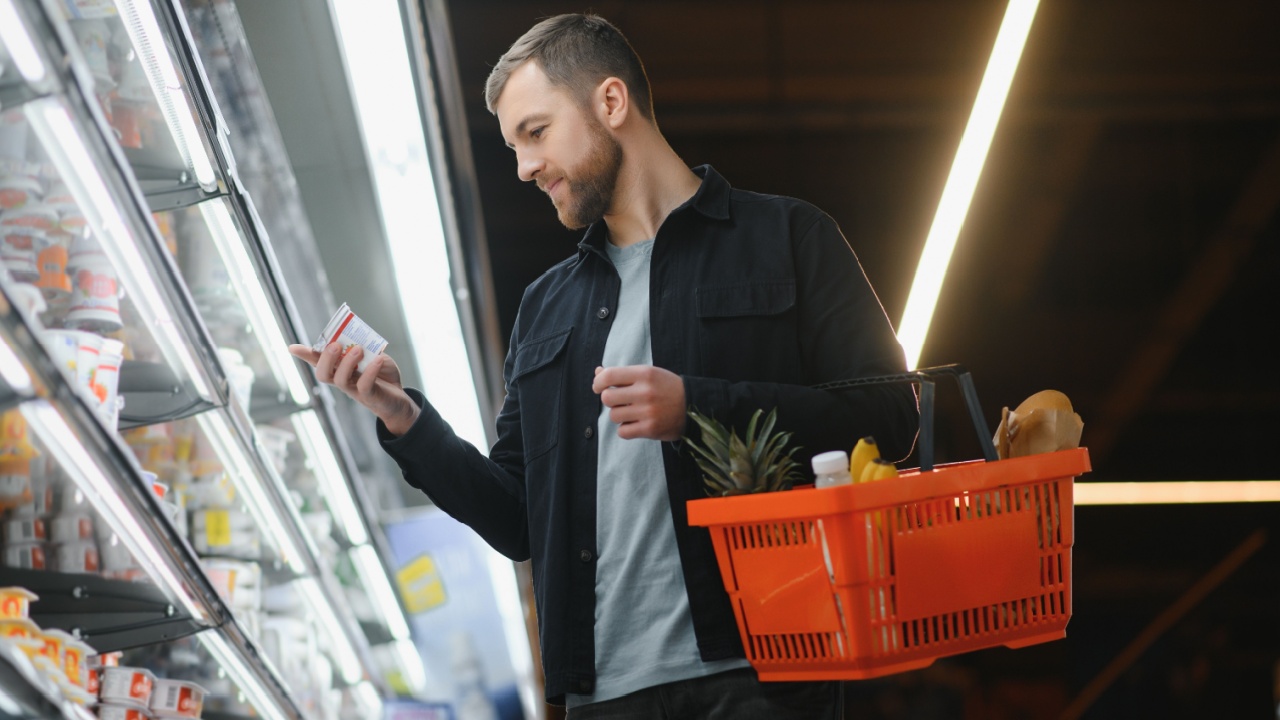 Man shopping in a supermarket.