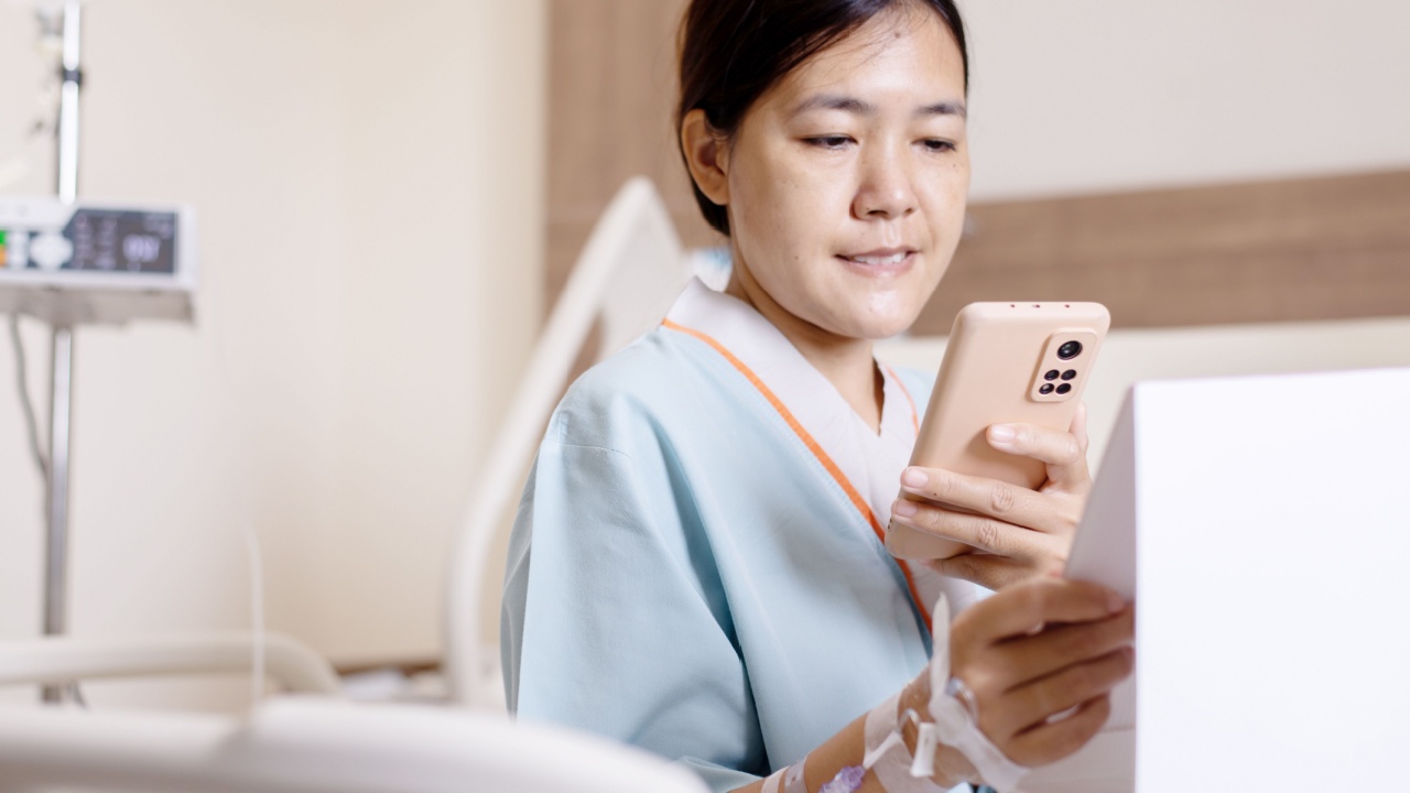 Sick woman using mobile phone scan qr codes to connect a doctor to health Information