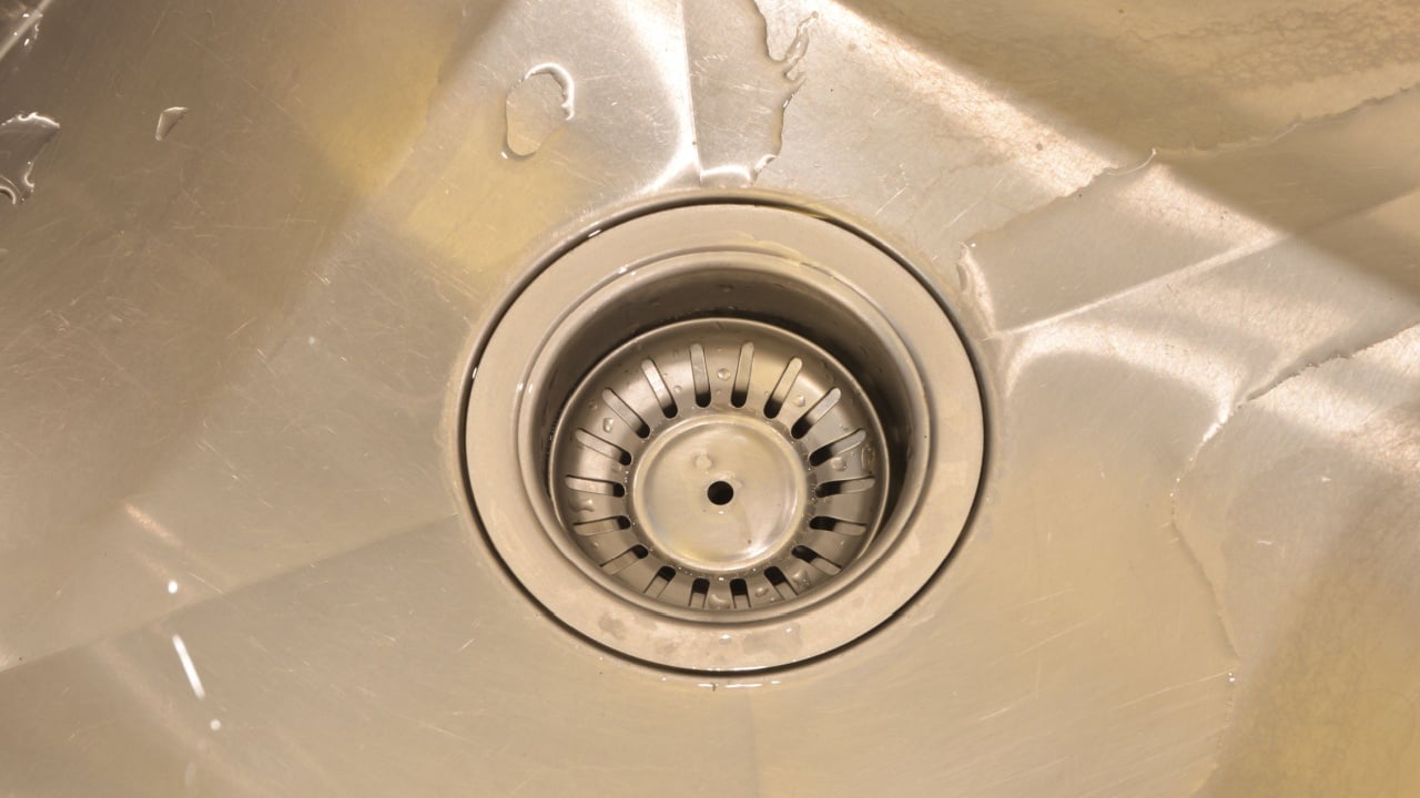 The view of the filter catching food waste in the sink