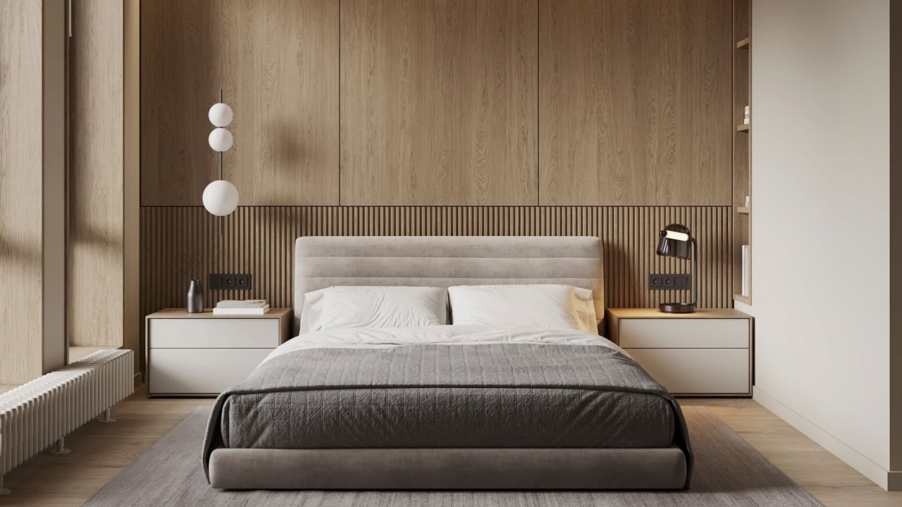 Contemporary bedroom with wood panel accent wall, neutral bedding, and minimalist lighting design.