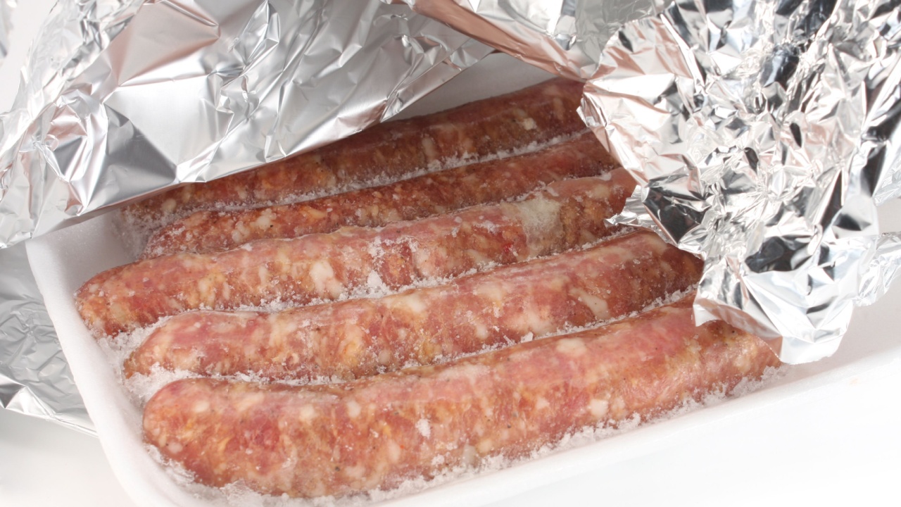 Frozen sausages in aluminum foil