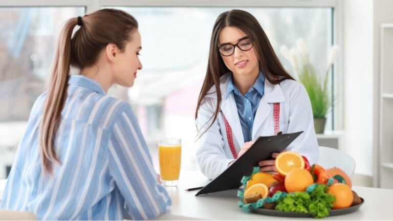 Young woman visiting nutritionist in weight loss clinic