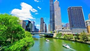 Chicago, USA - May 26, 2018 : View of the city center of Chicago with the tour boats running on Chicago River on a sunny day on May 26, 2018.