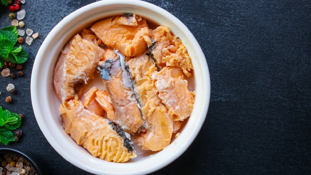 canned salmon, fish preserves (seafood in a tin can) pescatarian menu concept background. 