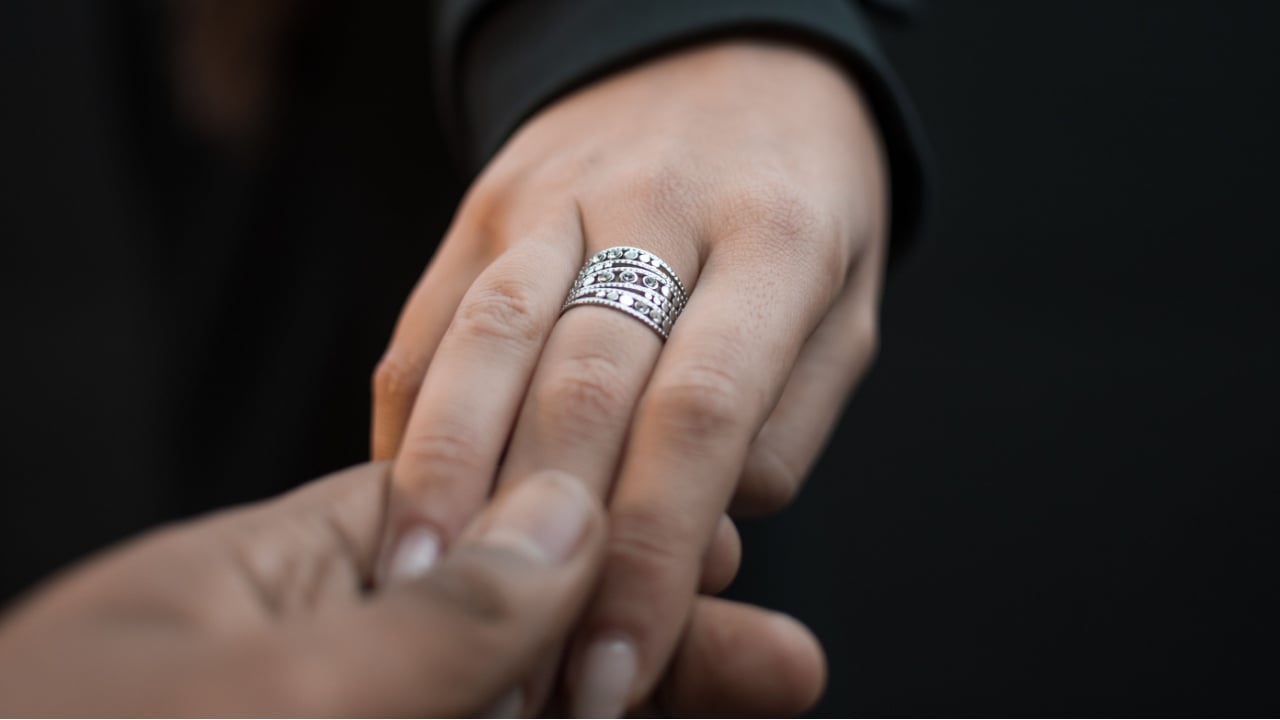 A closeup shot of a ring on a female hand