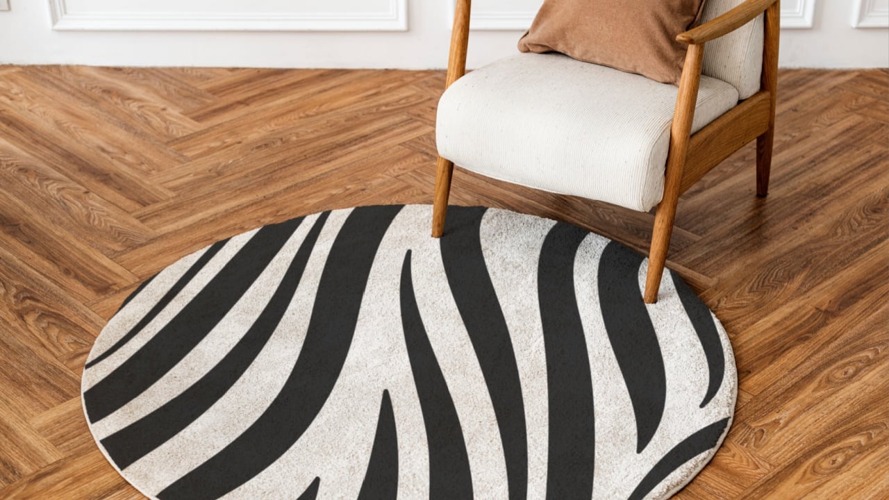 Round rug in zebra printed pattern living room essential