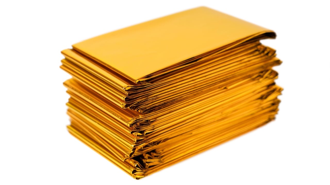 Emergency Rescue Gold Foil Isothermal Blankets. Isolated on a white background.