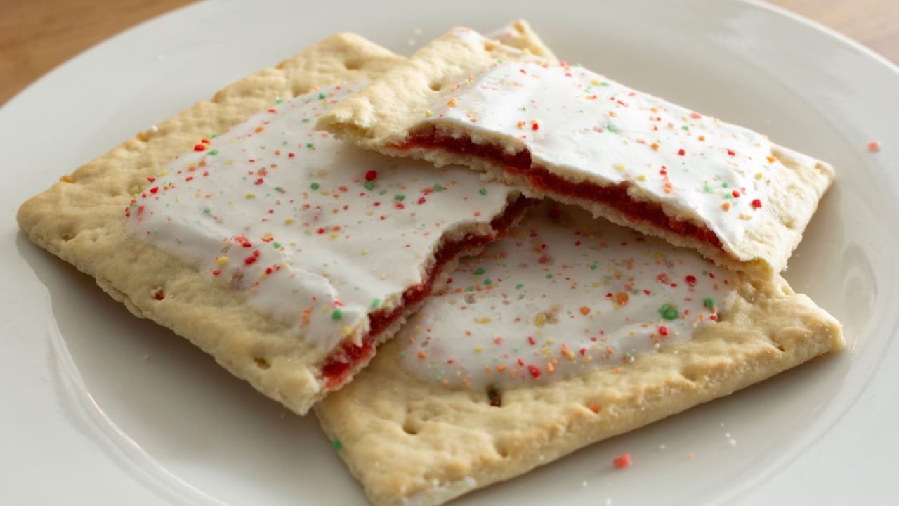 A view of some popular strawberry toaster strudels on a plate.
