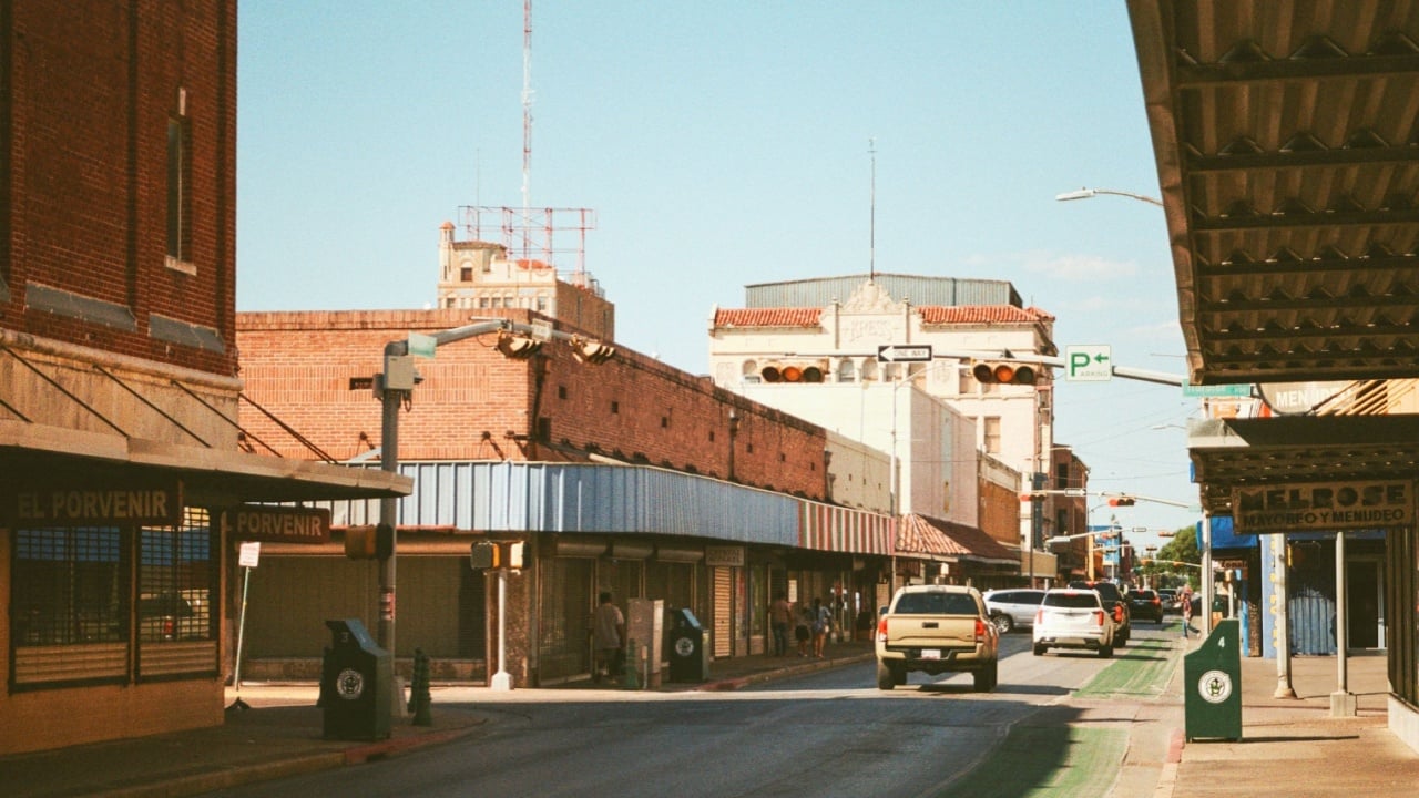 Laredo, Texas, USA - October 24, 2024: A film photograph of downtown Laredo under the clear blue sky.