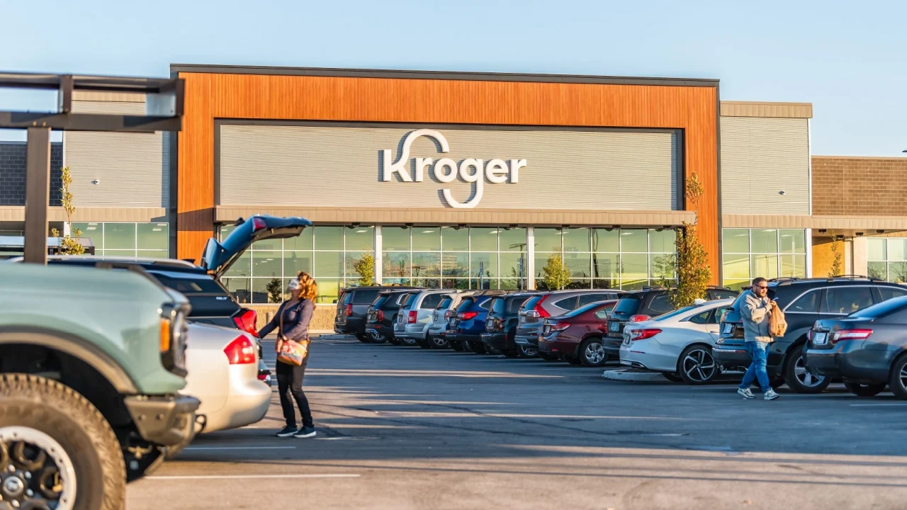 Brownsburg, USA - November 2, 2022: Midwest Indiana sign entrance for modern Kroger grocery store with logo and cars people in parking lot