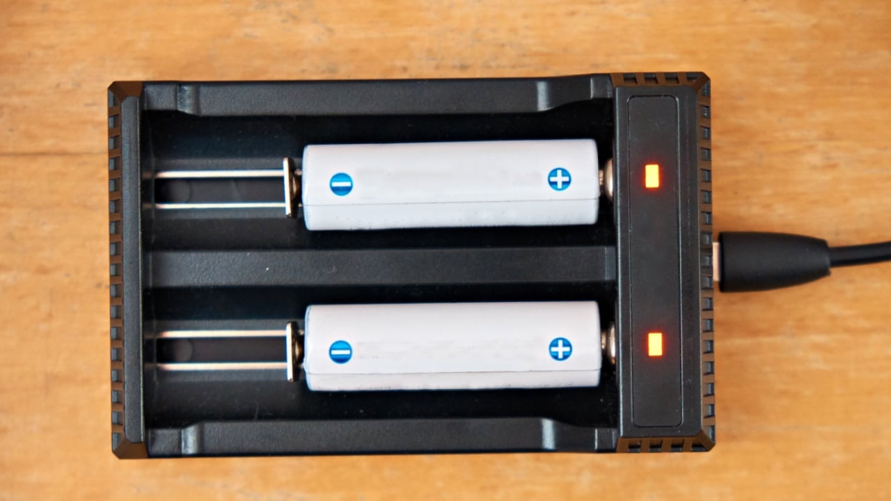 Rechargeable battery being charged. Quick Charger