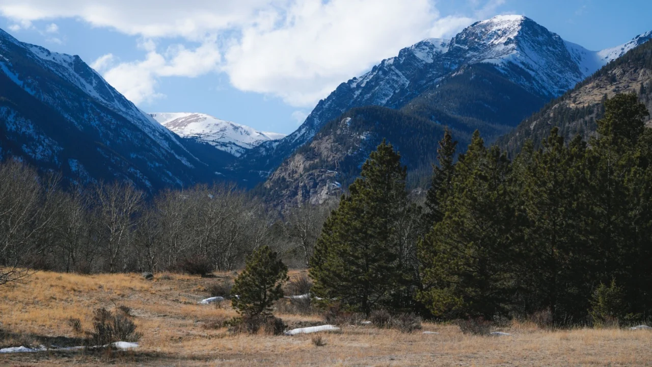 Estes Park, Colorado - April 18, 2024: A grassy valley at Rocky Mountain National Park.