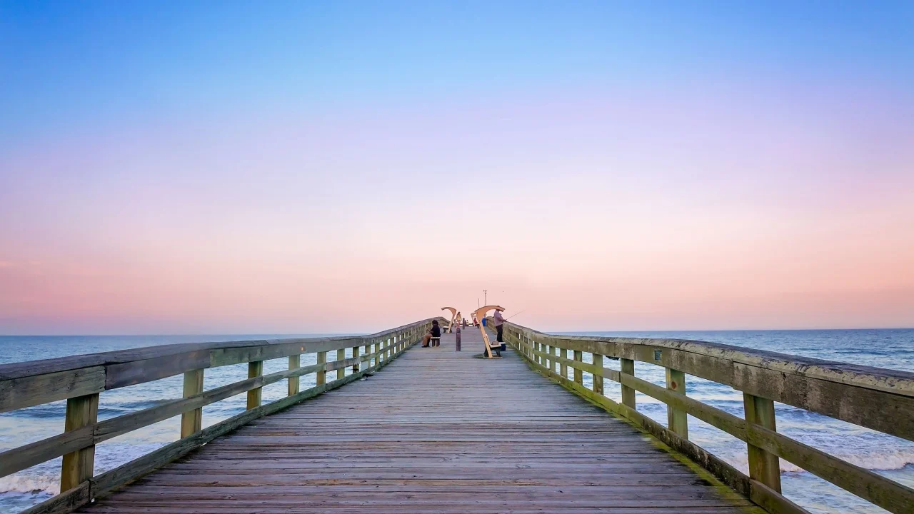 St. Augustine, Florida, USA - April 14, 2015: People gather at St. Johns County Ocean Pier in St. Augustine, Florida.