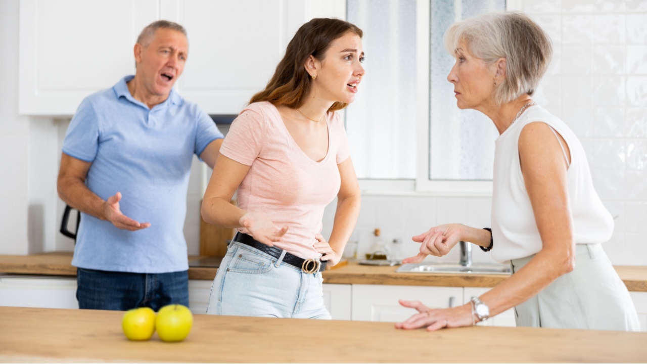 The daughter arguing with nervous old mature mother
