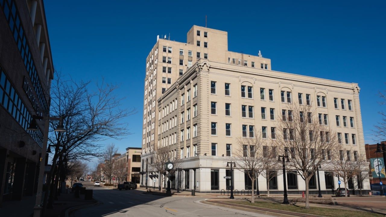 Decatur, Illinois – December 31, 2025: Afternoon light on a large building in downtown Decatur, with historic architecture and urban streetscape.