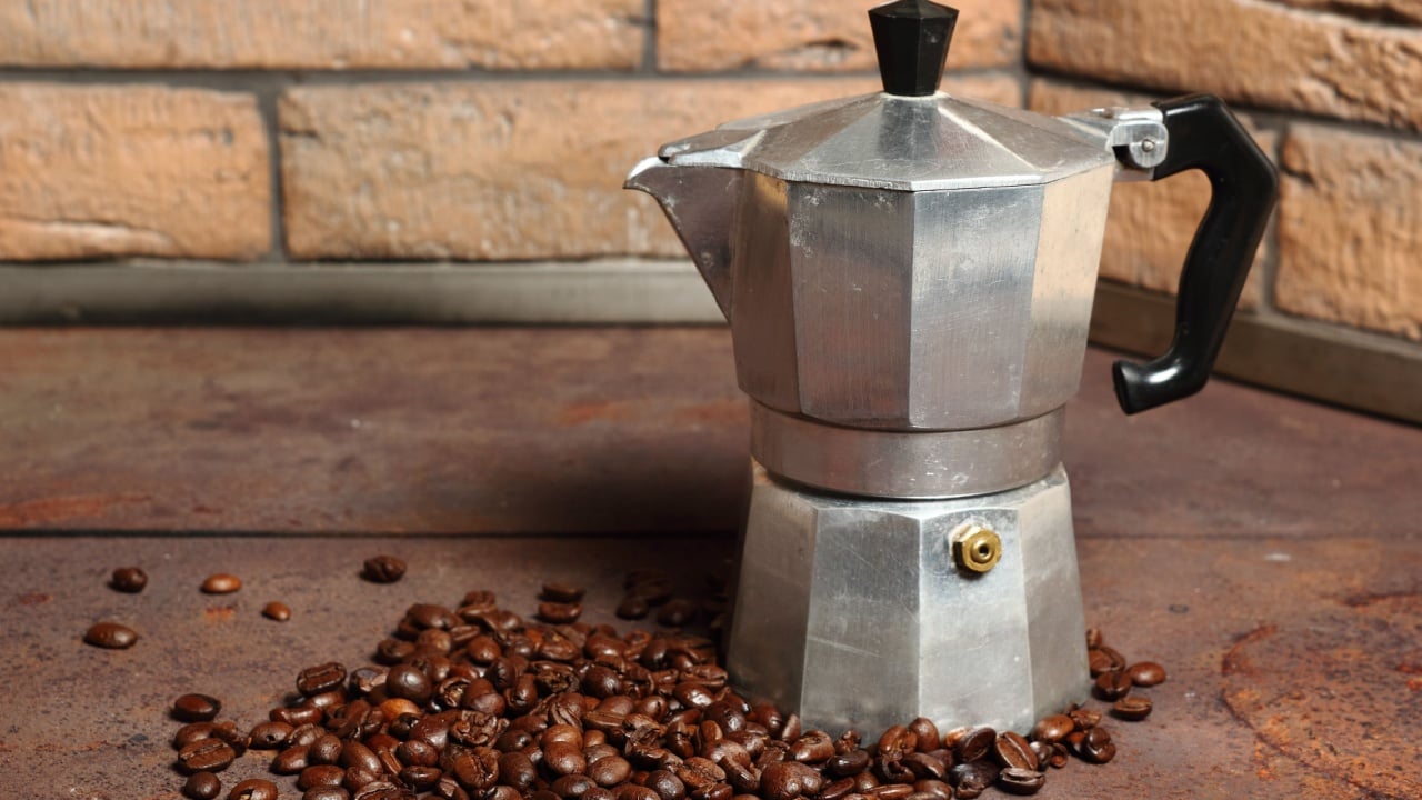Moka pot and coffee beans
