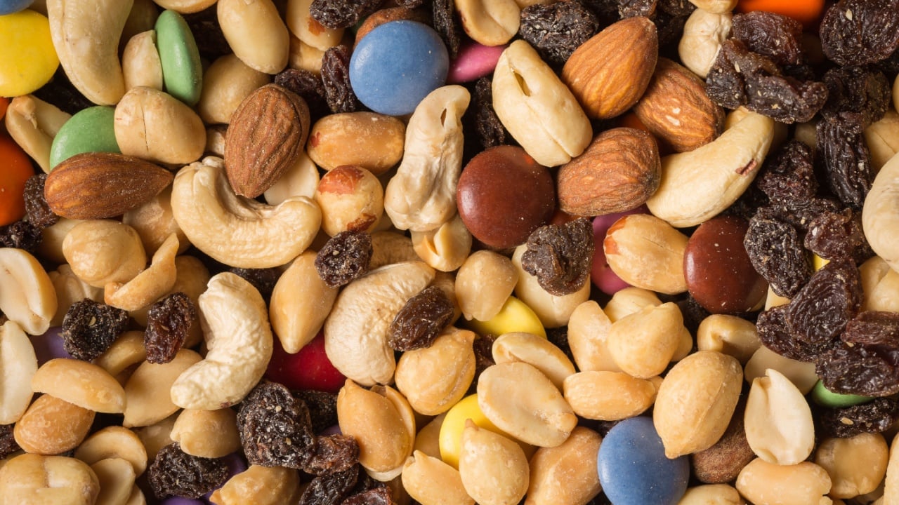 Pile of trailmix (nuts, raisins and candy)