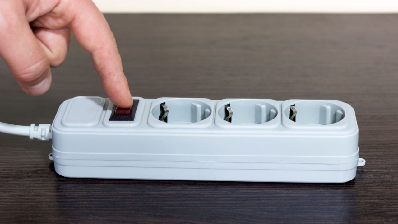 electrical socket, electrical power strip with switch, concept of saving electricity and turning off electrical appliances