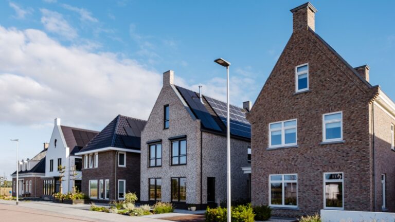 Dutch Suburban area with modern family houses, newly build modern family homes in the Netherlands, dutch family house in the Netherlands, newly build street with modern house