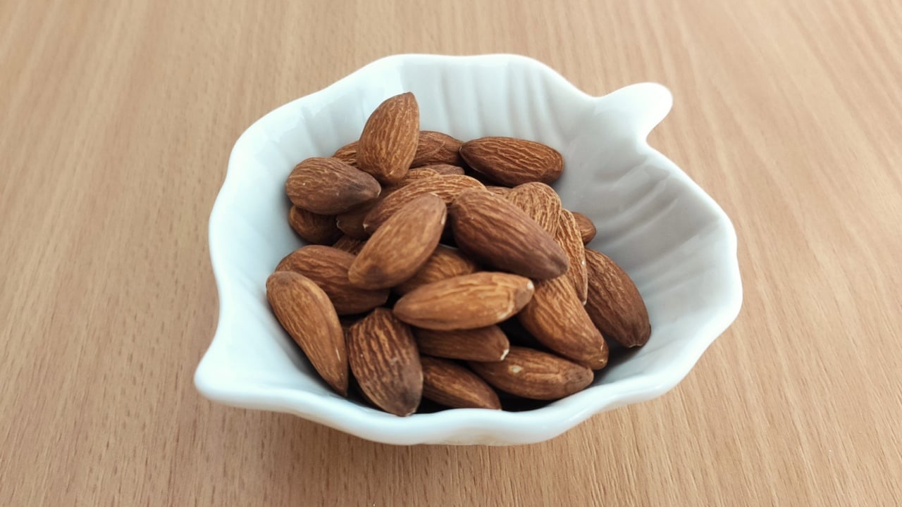 Brown almonds on the table