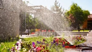home sprinkler watering lawn summer